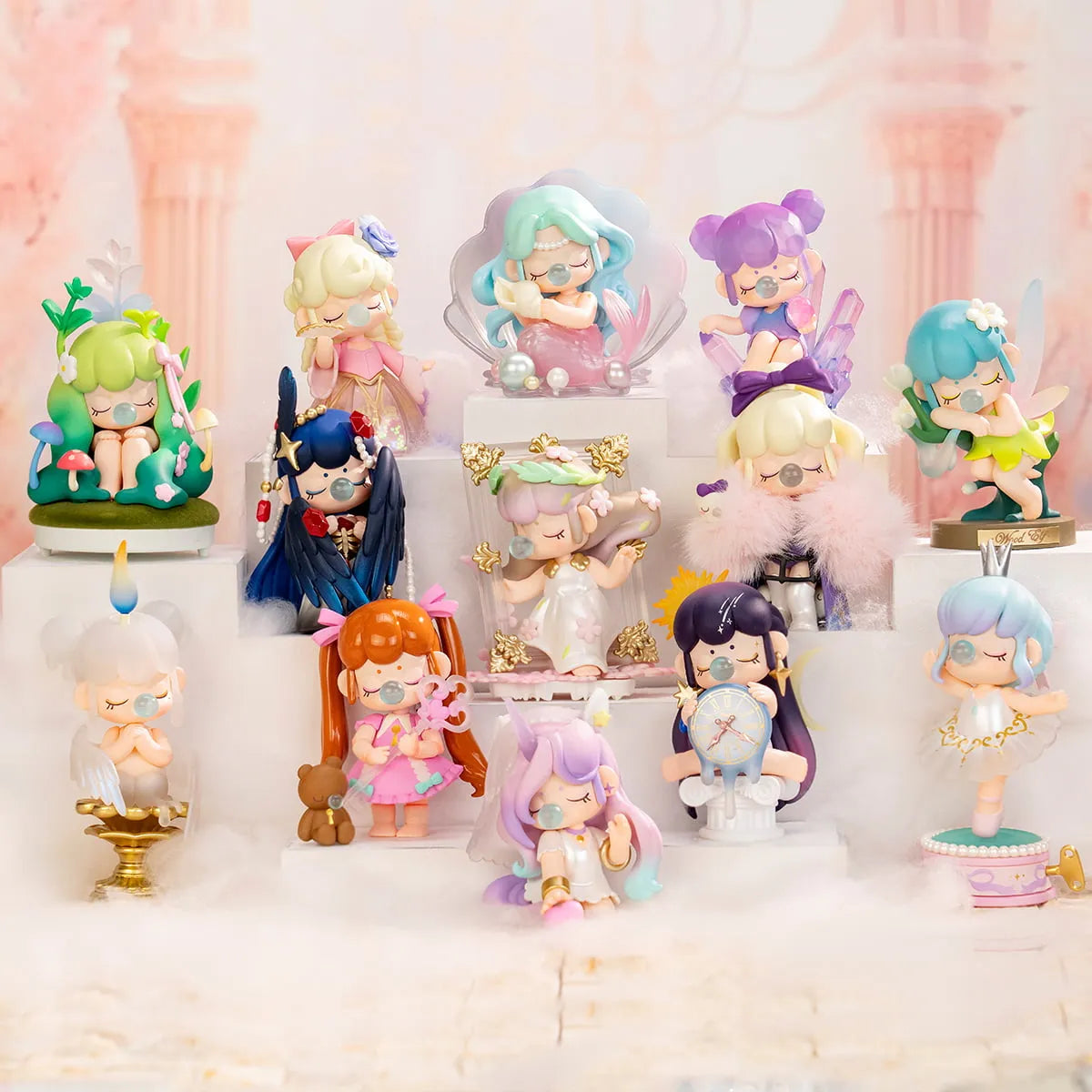 Collection of colorful figurines on a white surface with a soft pink background