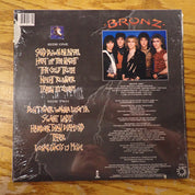 Bronze - Taken By Storm