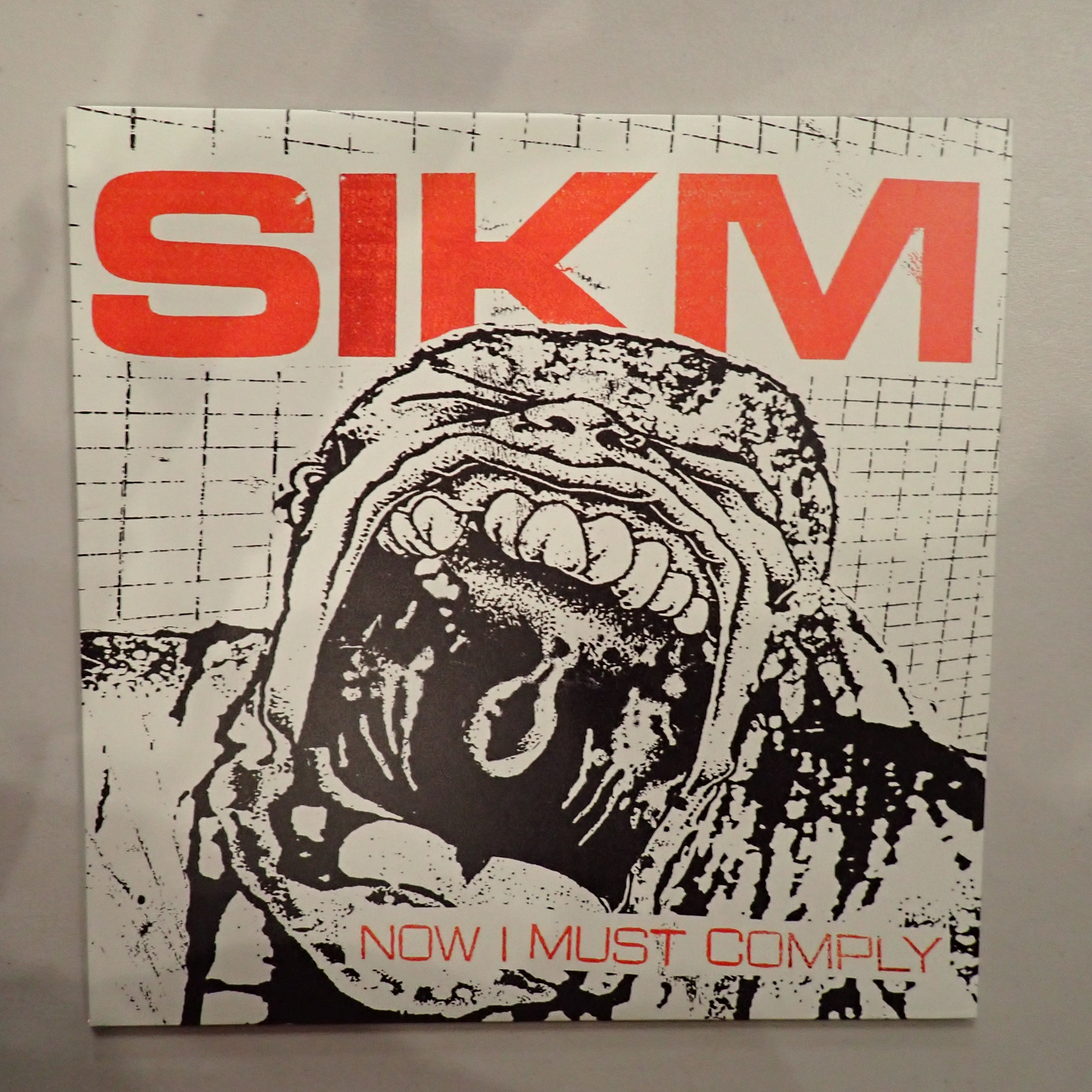 Sikm – Now I Must Comply