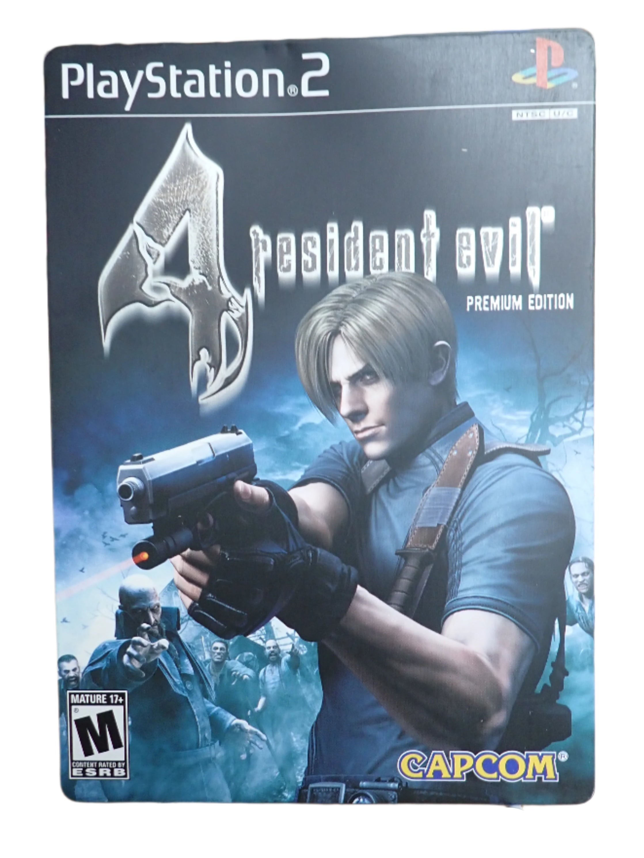 A PlayStation 2 game disc for 'Resident Evil 4: Premium Edition' with visible dent on the back left corner.