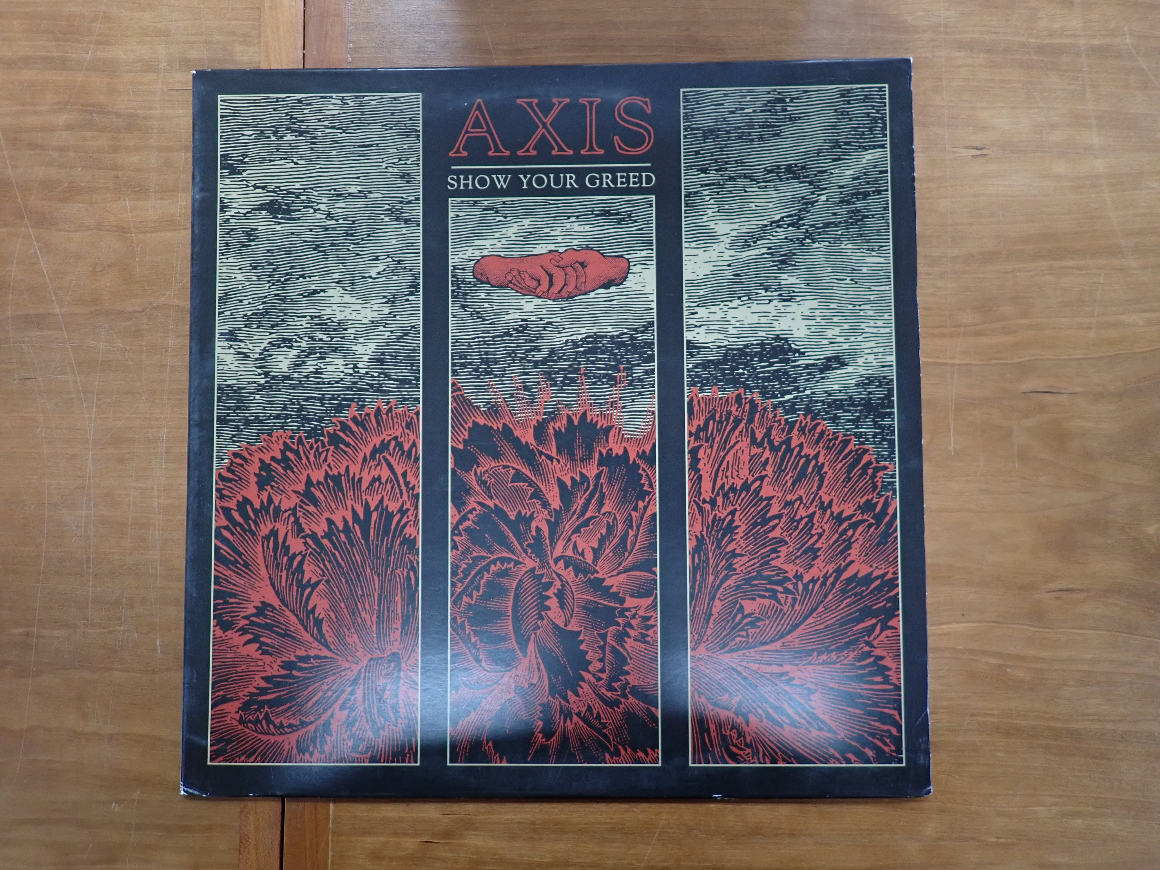 Axis - Show Your Greed