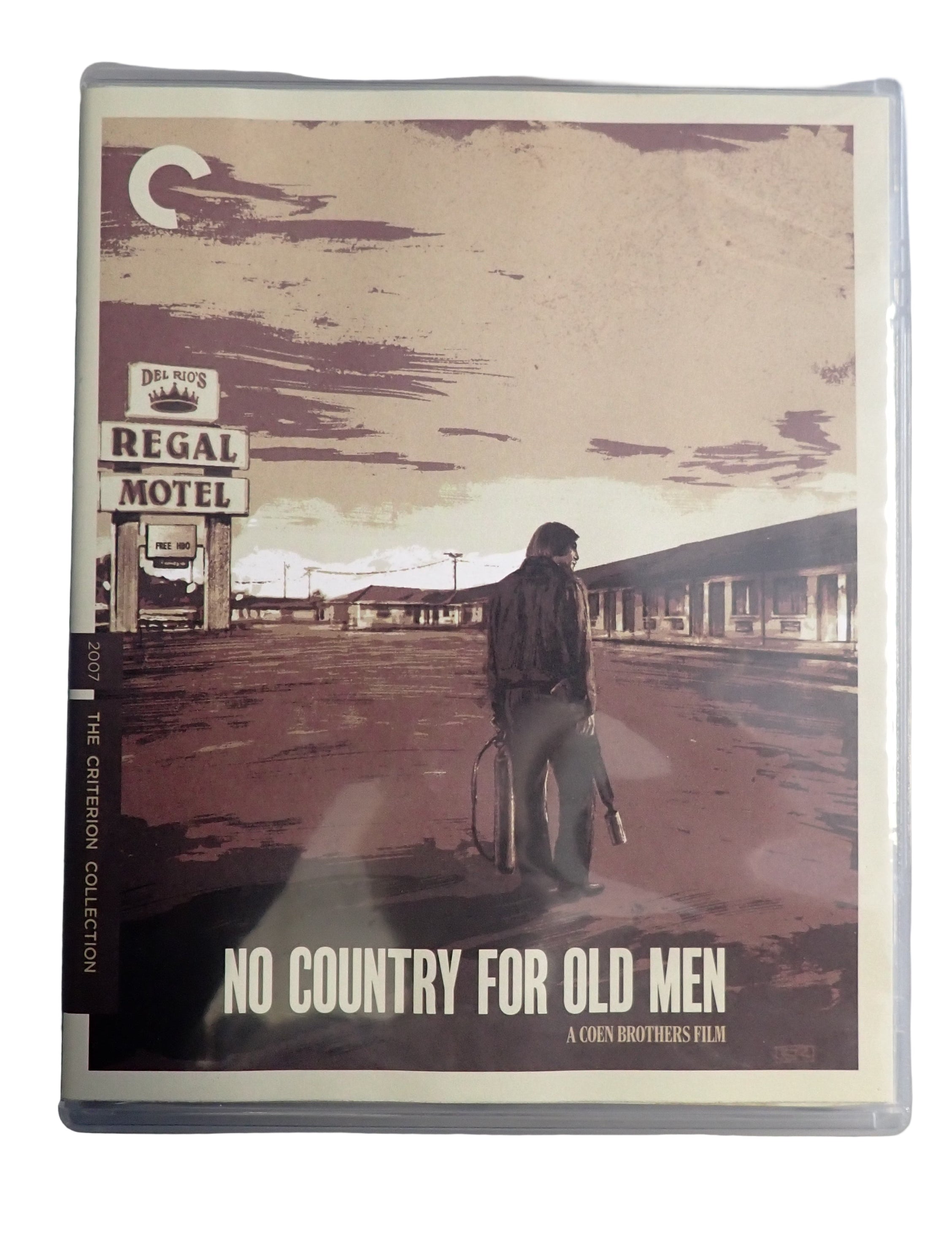 DVD cover of 'No Country for Old Men' with a man standing in front of a motel.