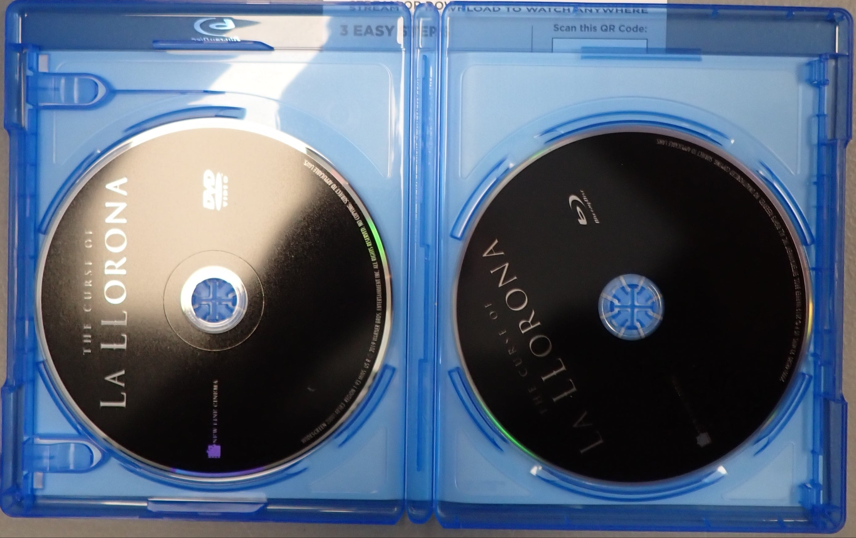 Blu-ray case of 'La Llorona' with two discs and a digital movie code card on a gray surface.
