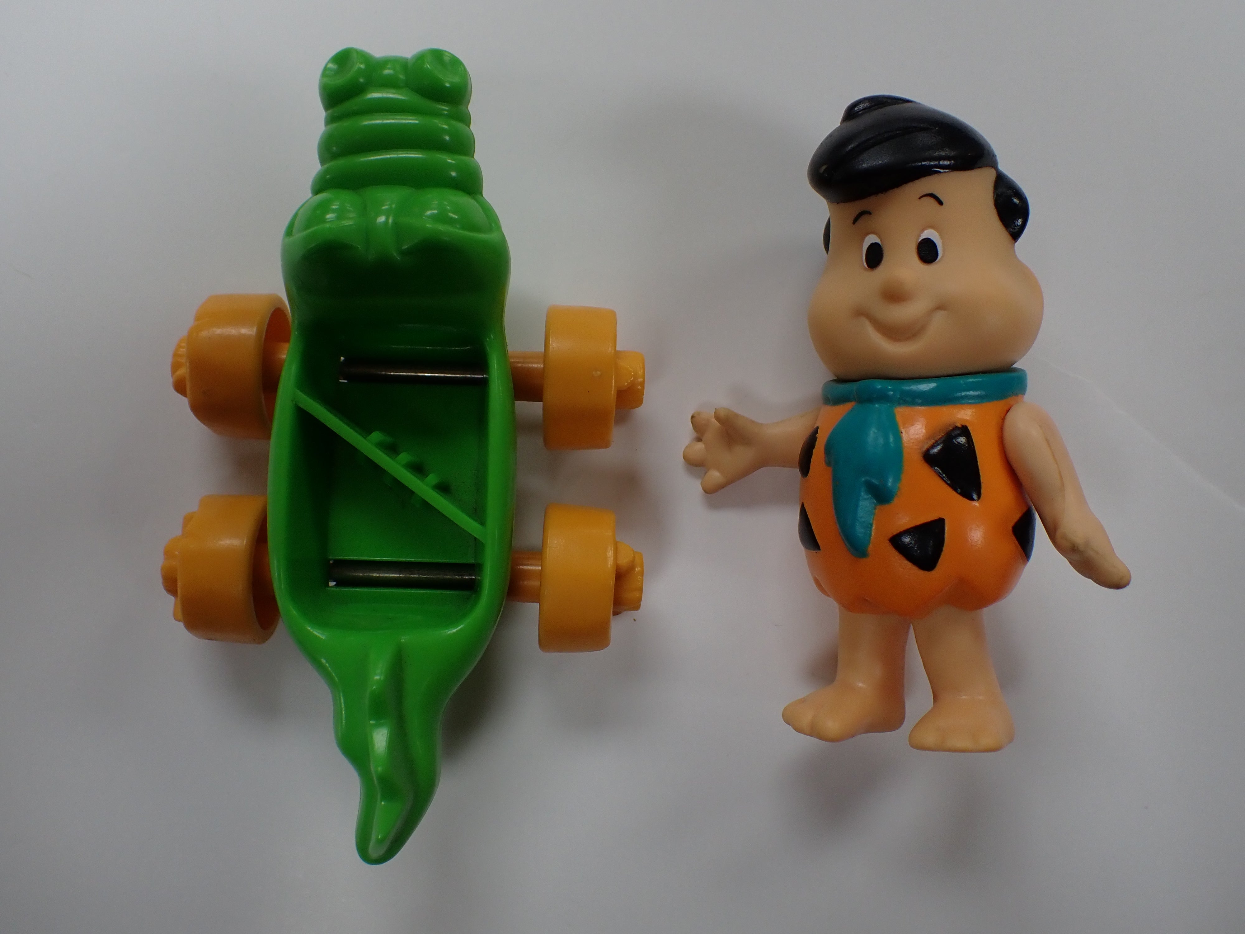 Young Fred Flintstone on Dinosaur Skateboard 1986