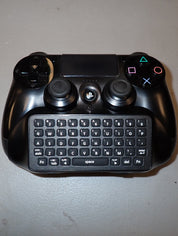 PS4 Controller + Keyboard Attachment.