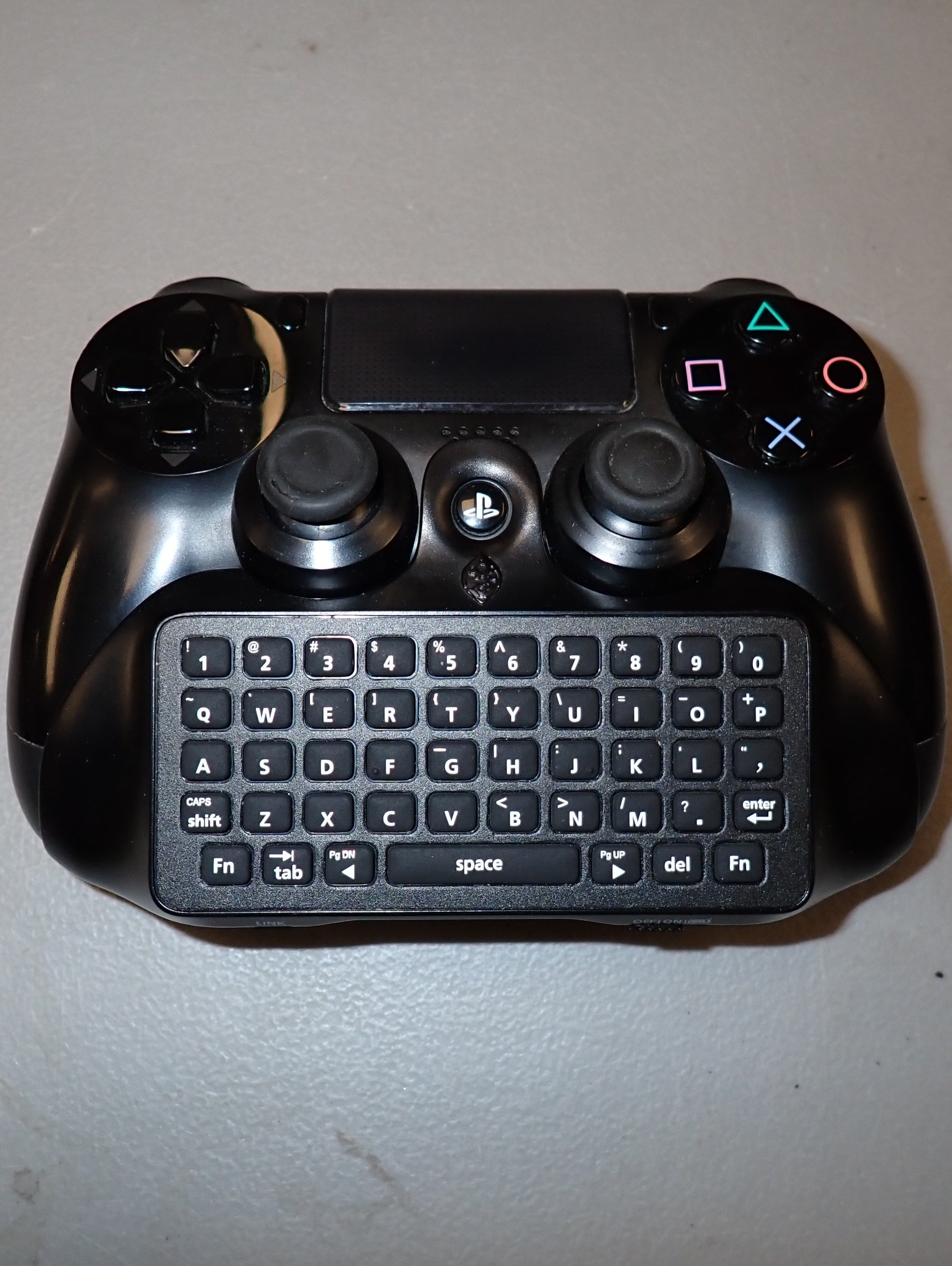 PS4 Controller + Keyboard Attachment.