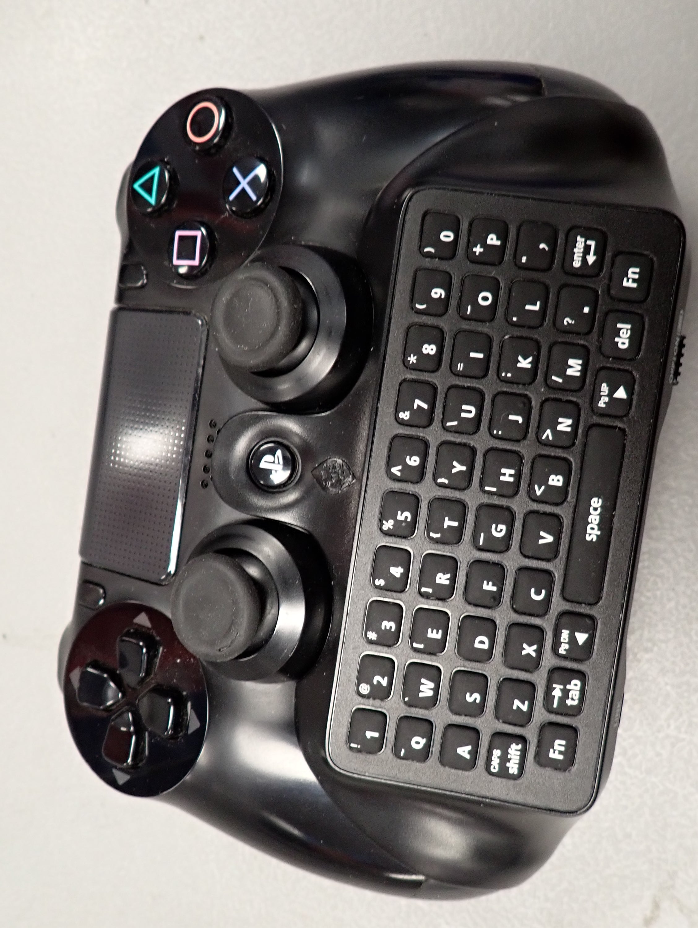 PS4 Controller + Keyboard Attachment.
