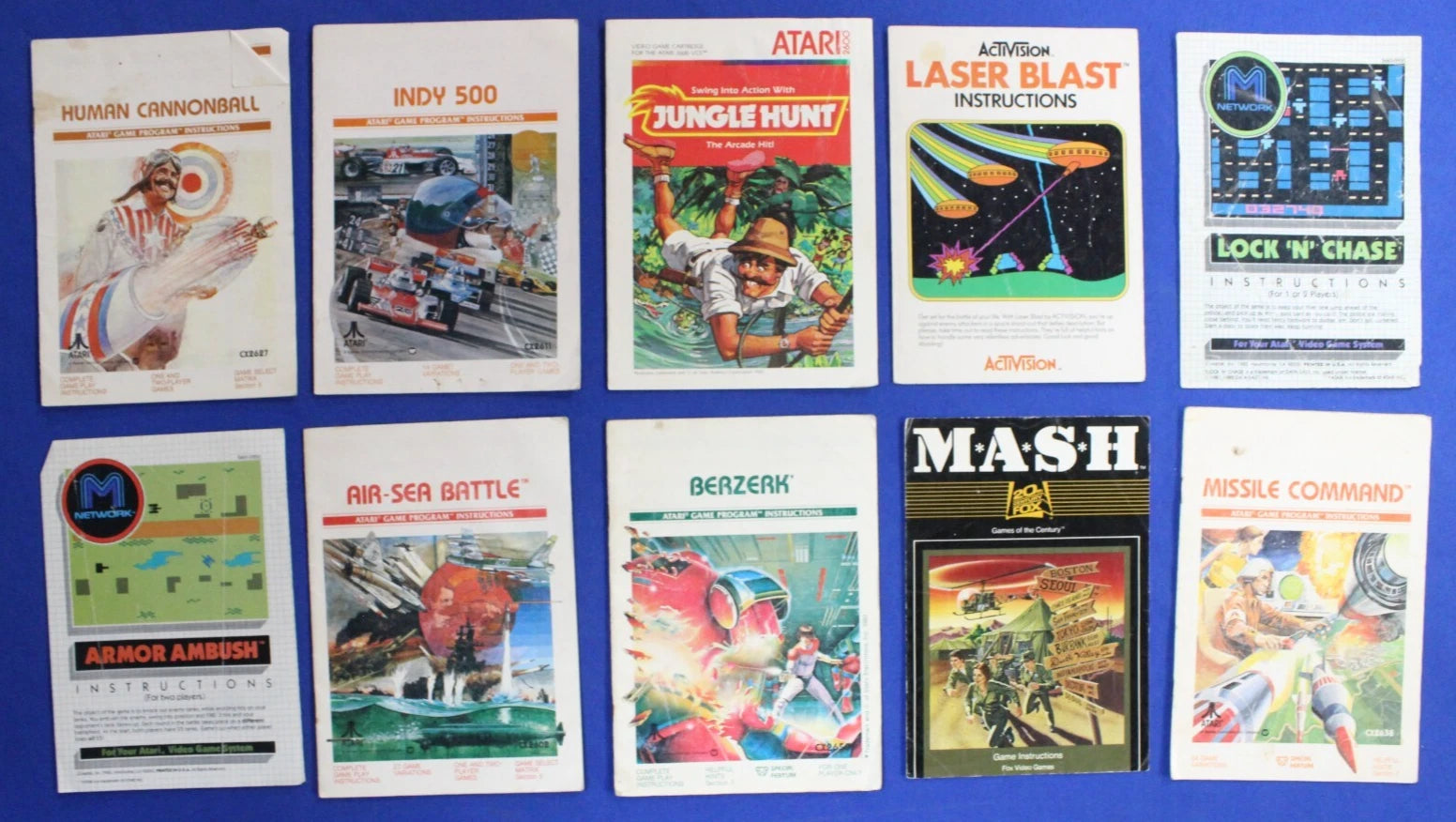 Lot of 54 Manuals Atari Sega Saturn Galoob Game Genie Sega Genesis