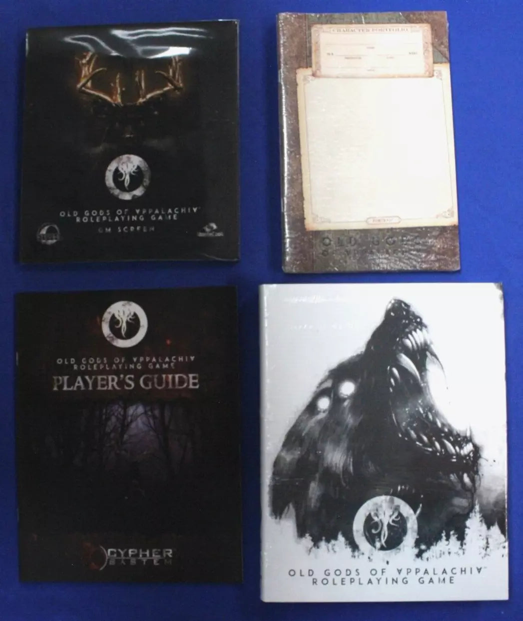 Old Gods of Appalachia Roleplaying Game Core Rulebook, Player's Guide, GM Screen, & Character Portfolio